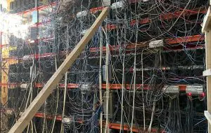 Fermă clandestină de criptomonede, descoperită de ANAF